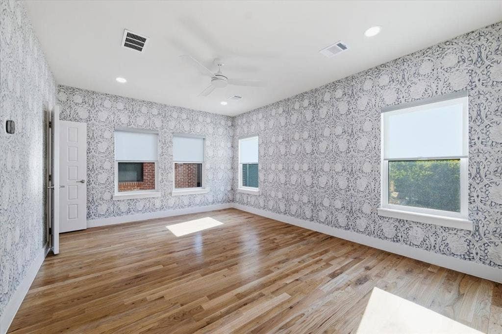 7108 Brisa Drive, Dallas, TX 75223 Walk in closet, dramatic custom wall paper, private bathroom on second level