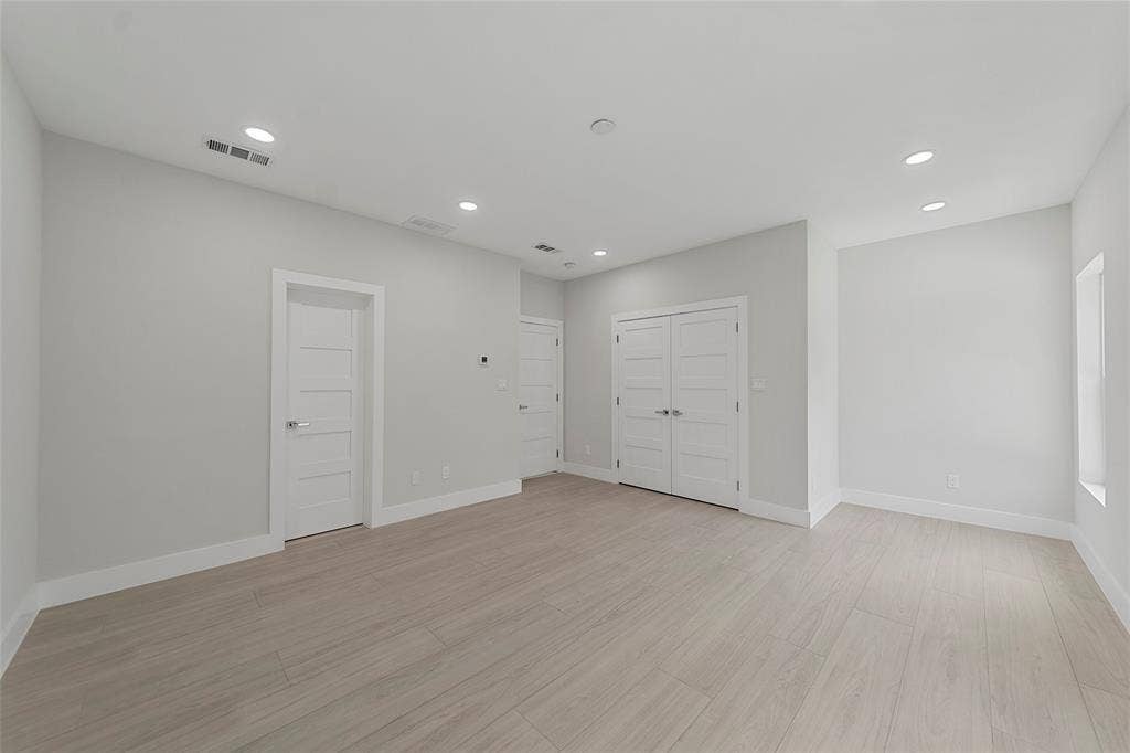 2503 Crossman Avenue, Dallas, TX 75212 Interior space featuring wood-finish flooring, recessed lighting, and multi-panel interior doors
