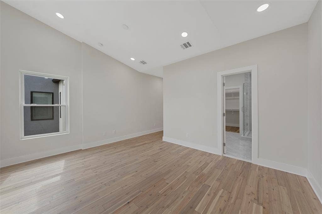 2503 Crossman Avenue, Dallas, TX 75212 Vaulted ceiling with recessed lighting and wood-finish flooring