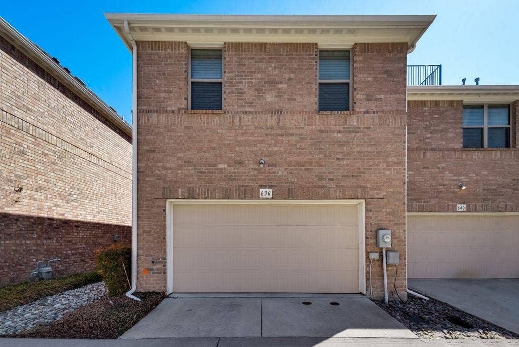636 S Greenville Avenue, Richardson, TX 75081 View of front facade featuring a garage