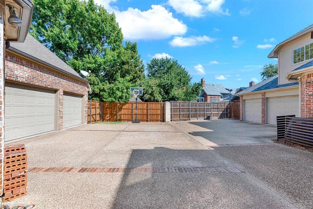2608 LAWTON Lane, Plano, TX 75093 The large paved area offers plenty of room for parking and recreation.