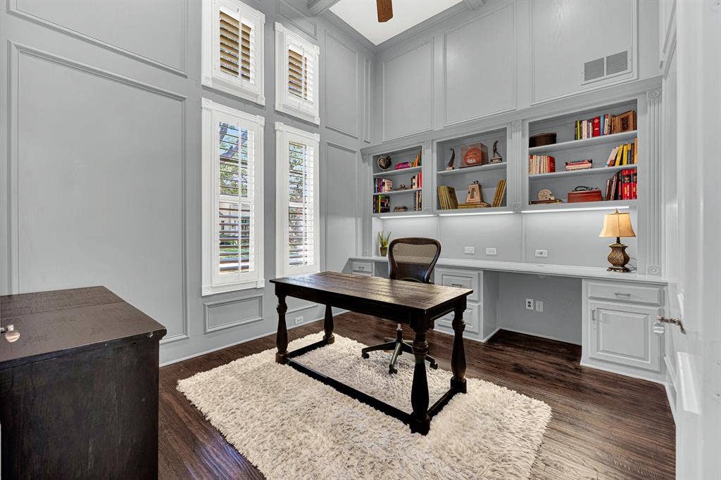 2608 LAWTON Lane, Plano, TX 75093 Soaring wainscoted walls and stacked multi-pane windows bring effortless brightness into this lofty study space. It is the perfect peaceful sanctuary to sip your morning espresso while reviewing the day's schedules before the house awakens.