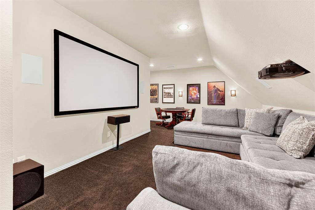 2608 LAWTON Lane, Plano, TX 75093 Angled attic ceilings create a authentic cinematic theater shape above plush wall-to-wall carpeting. Picture gathering the family together with freshly popped popcorn for an immersive Friday night movie marathon.