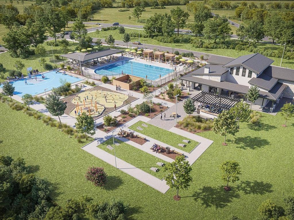Community amenities featuring an outdoor swimming pool, a multi-use sports court, a playground, a structured pavilion, and landscaped green space