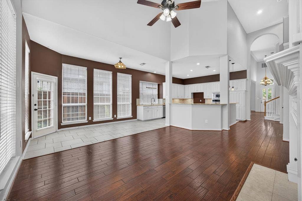 425 Waterside Drive, Irving, TX 75063 Living room, breakfast area, and kitchen view