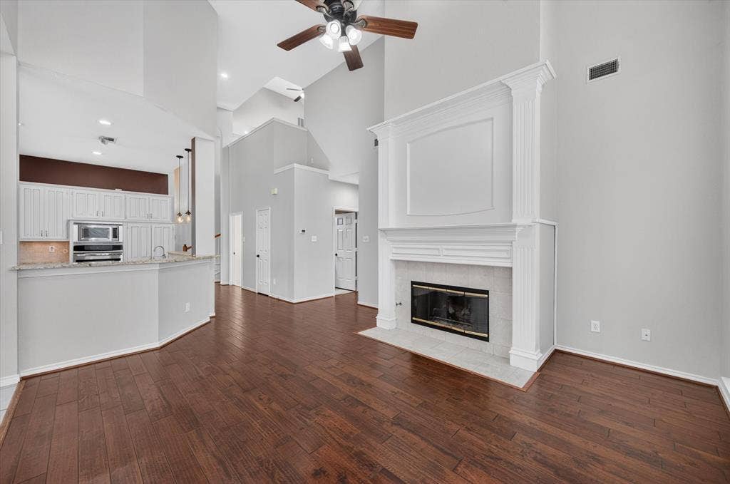 425 Waterside Drive, Irving, TX 75063 Living room adjacent from breakfast area and kitchen