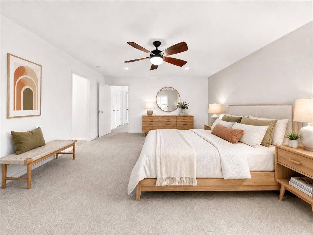 12627 Breckenridge Drive, #200, Dallas, TX 75230 Neutral-toned wall-to-wall carpeting, recessed lighting, and a dark-finish ceiling fan with integrated lighting