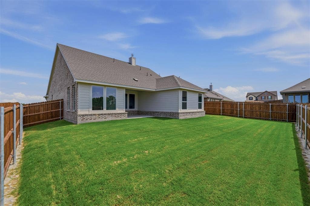 2109 Bluebird Lane, Anna, TX 75409 Expansive lawn bordered by wood fencing