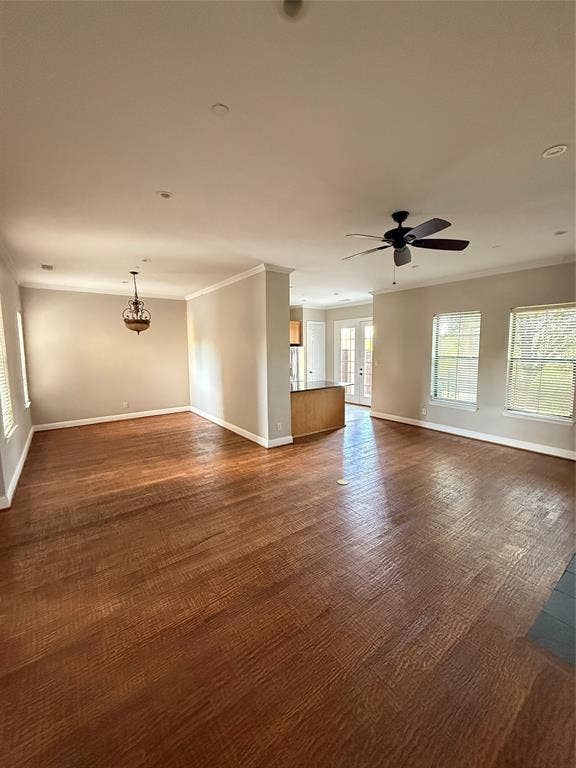 1025 Emerson Park Lane, Irving, TX 75063 Open interior featuring wood-finish flooring, crown molding, recessed lighting, a ceiling fan, and multi-paned glass exterior doors