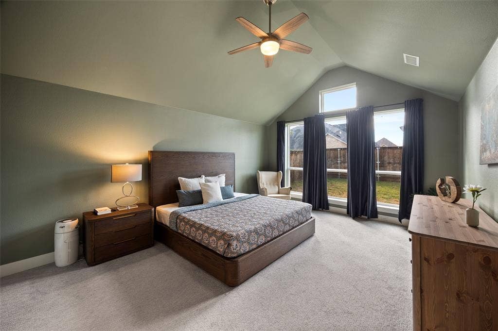 2820 Eccleston Street, Celina, TX 75009 Vaulted ceilings, expansive windows, and a ceiling fan fixture