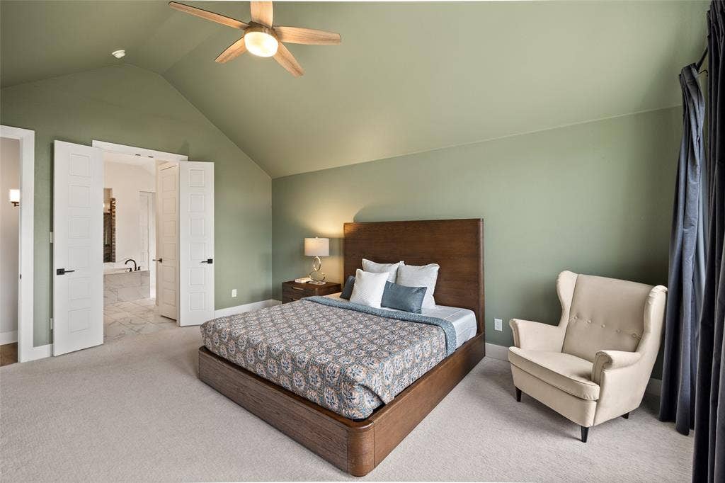 2820 Eccleston Street, Celina, TX 75009 Vaulted ceiling with an integrated light-equipped ceiling fan, double-door entryway, and neutral carpeting