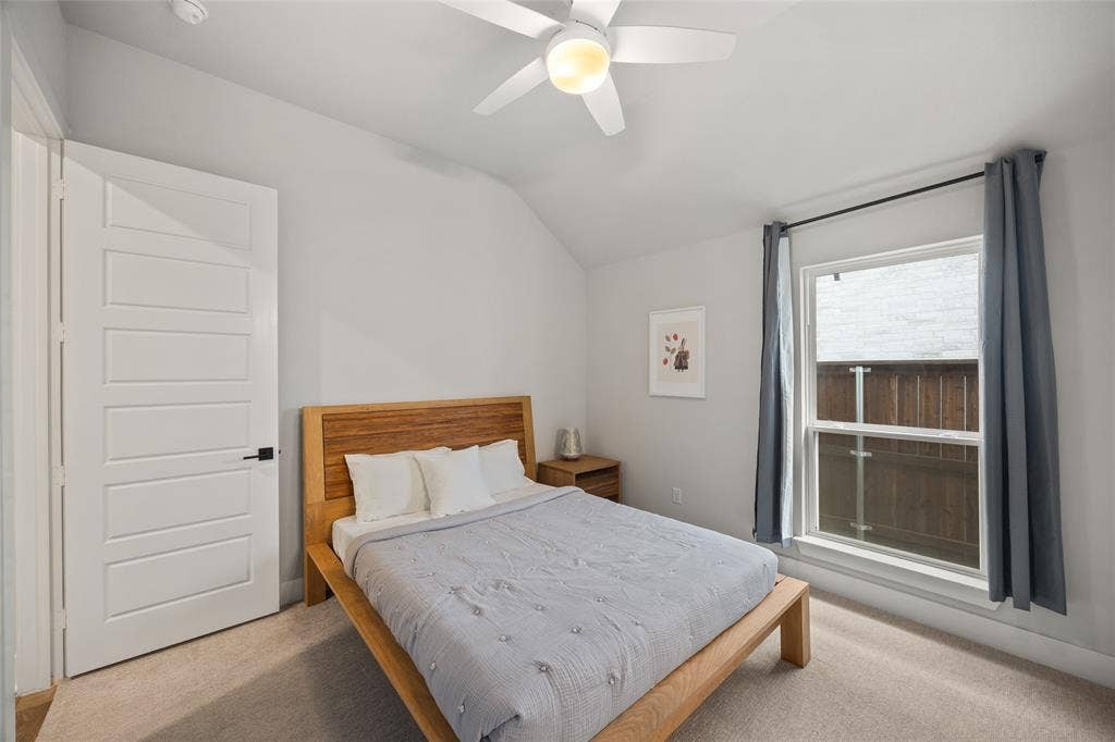 2820 Eccleston Street, Celina, TX 75009 Vaulted ceilings, neutral carpeting, five-panel interior door, and a ceiling-mounted light fixture with fan