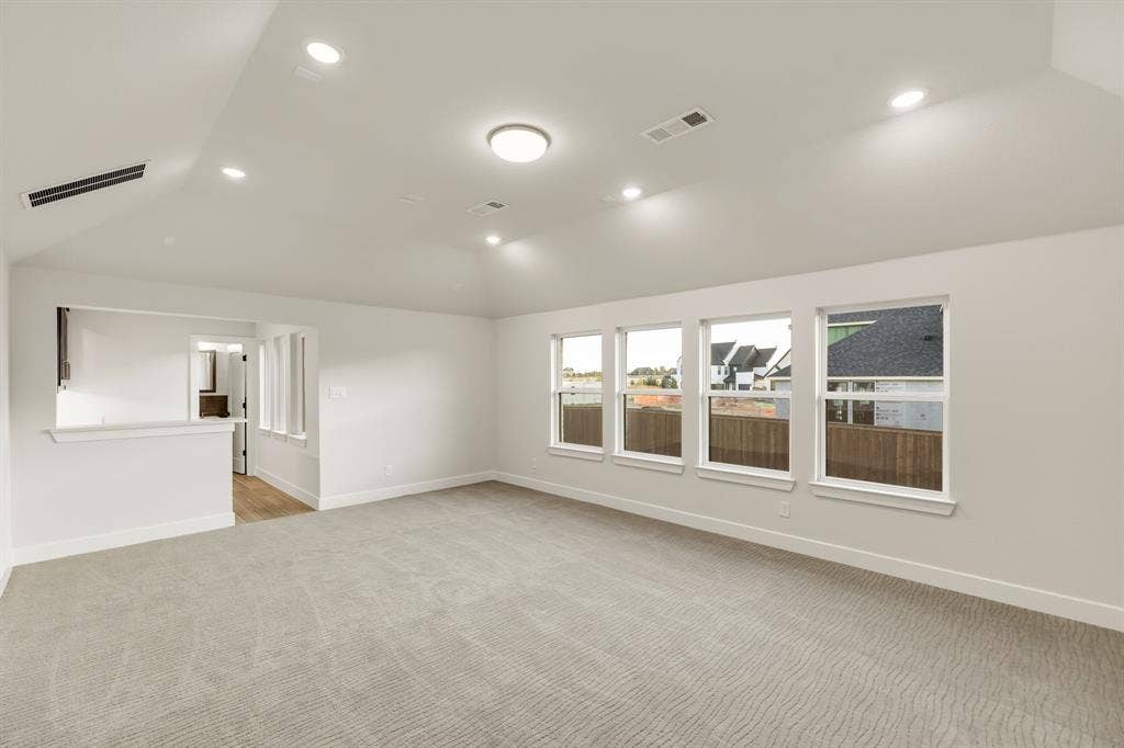 upstairs Media room with a full wet bar and a powder bathroom