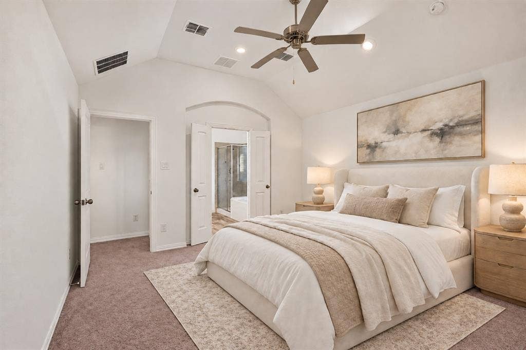 Vaulted ceilings featuring a central overhead fan, recessed lighting, and dual-door entries