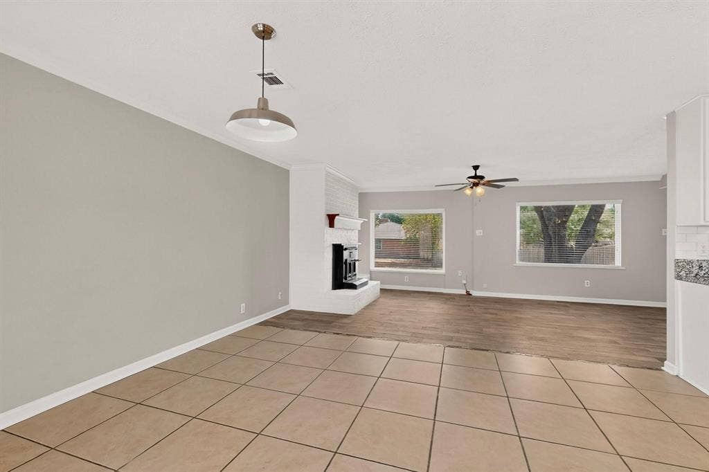 501 Starling Drive, Mesquite, TX 75149 Open dining area with clean tile flooring, perfect for a fresh design.