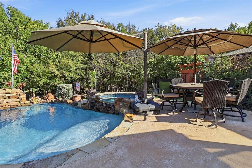 1614 Jeffrey Drive, Wylie, TX 75098 Incredible pool/spa deck provides for family and entertaining summertime fun.