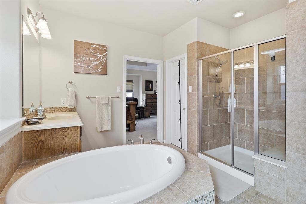 1614 Jeffrey Drive, Wylie, TX 75098 Expansive Primary Bath's oversized walk-in shower