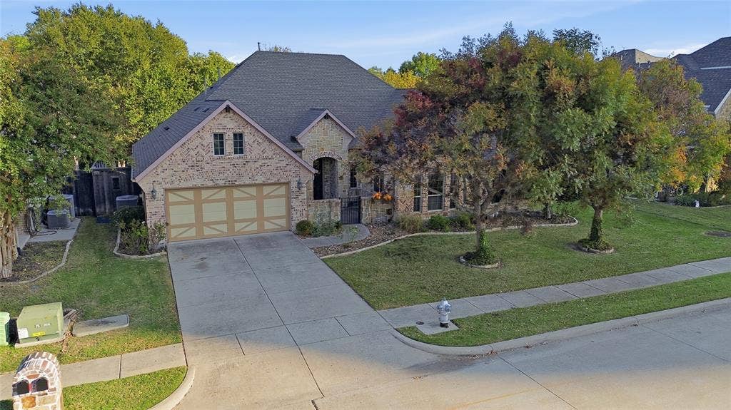 1614 Jeffrey Drive, Wylie, TX 75098 On street with million-dollar homes
