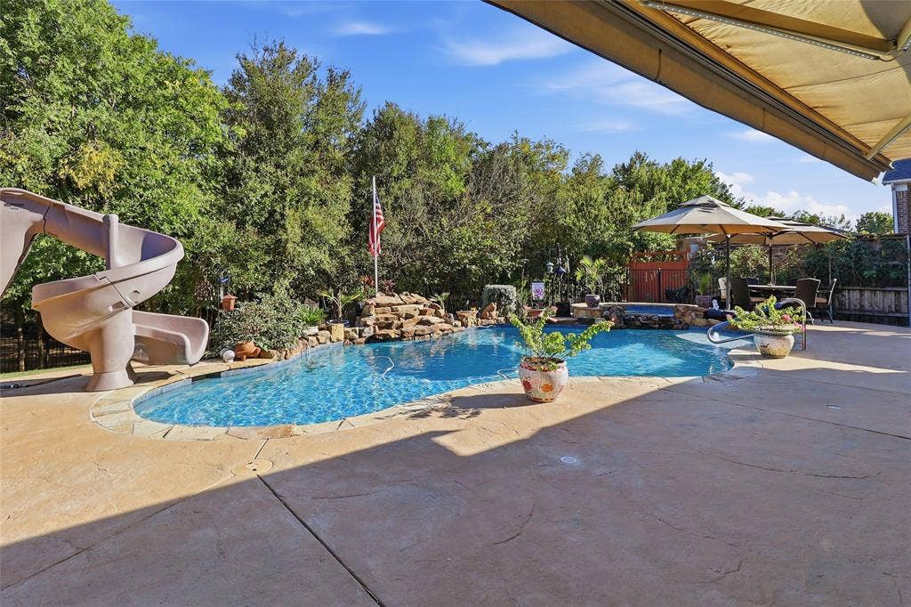 1614 Jeffrey Drive, Wylie, TX 75098 Pool has slide and water fall
