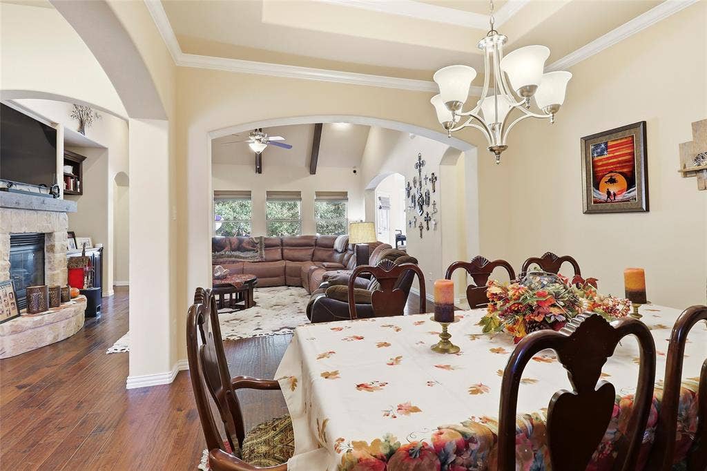 1614 Jeffrey Drive, Wylie, TX 75098 Formal Dinng features elevated ceiling, crown molding and is open to Living area.