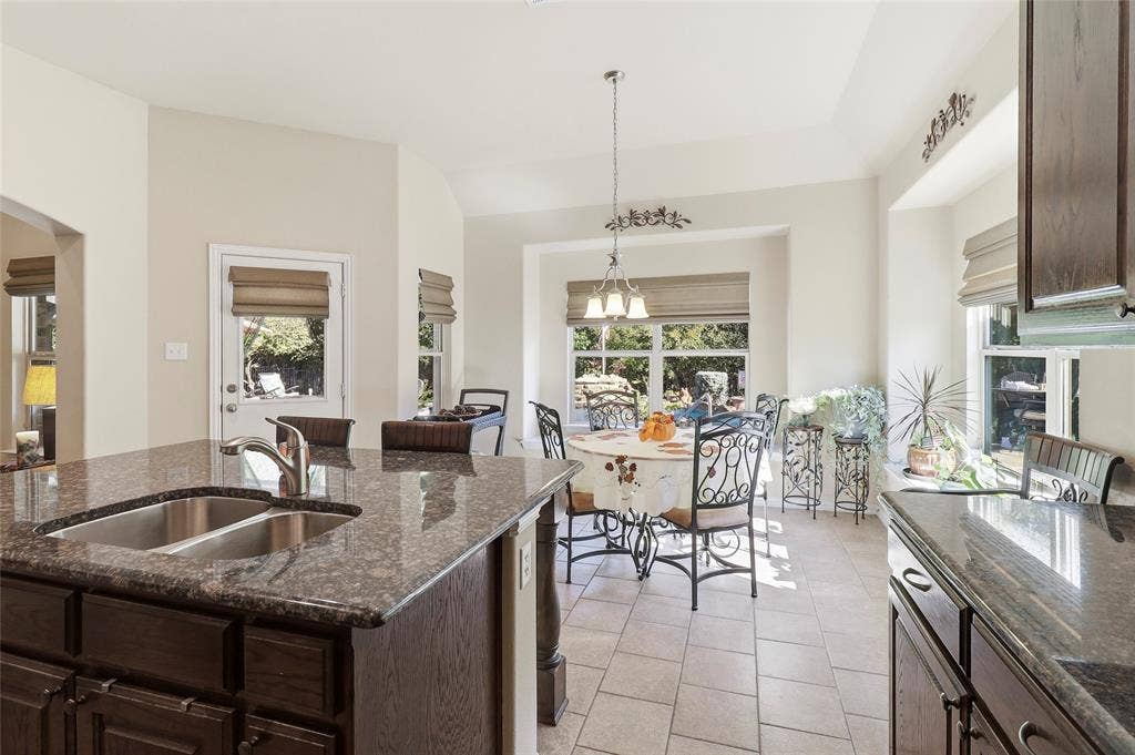1614 Jeffrey Drive, Wylie, TX 75098 Expansive Breakfast area with a view of backyard and pool