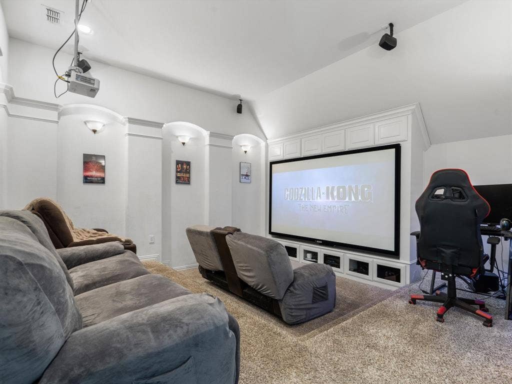 1506 Hennessey Drive, Allen, TX 75013 Experience endless nights of cinematic bliss in our state-of-the-art media room, equipped with a 4K projector, 7.1 surround sound, and plush lounge chairs.