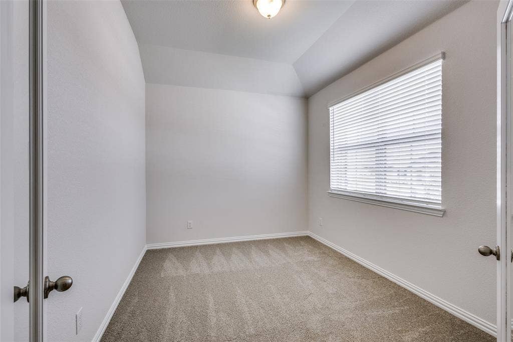 3325 Cross Shore Drive, Anna, TX 75409 Carpeted spare room with baseboards