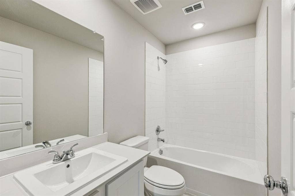 2021 Steeplechase Lane, Seagoville, TX 75159 Bathroom in the Harper home plan – REPRESENTATIVE PHOTO