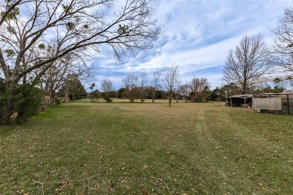 9459 County Road 313, Terrell, TX 75161 Large open area, surrounded by trees, located at back of property