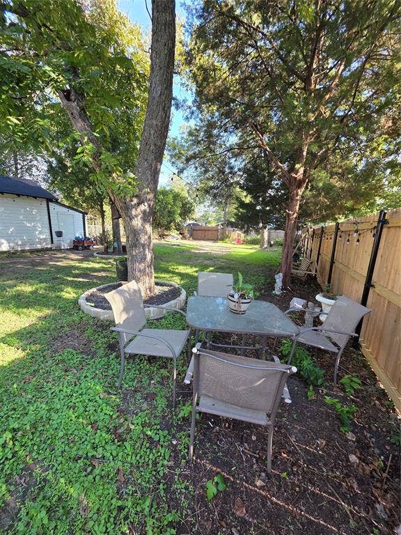 2108 Lyle, Waco, TX 76708 Great shaded sitting area in backyard