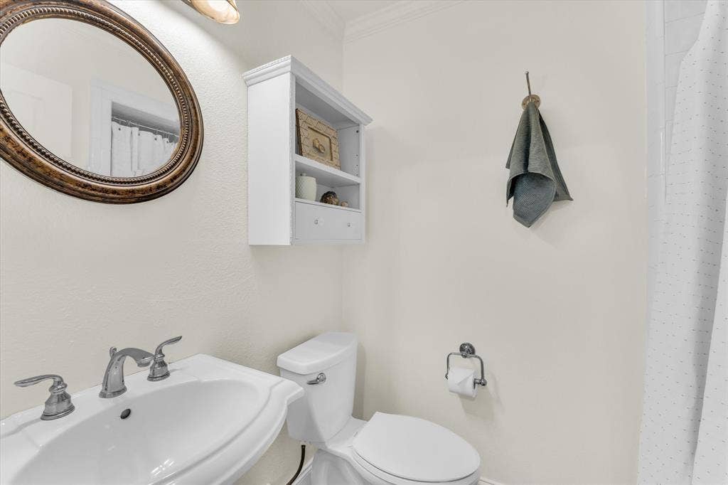 Bathroom closer to the kitchen, living rm area