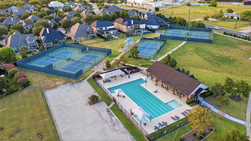 1919 Kings Pass, Heath, TX 75032 Community swimming pool with covered patio and multiple tennis courts