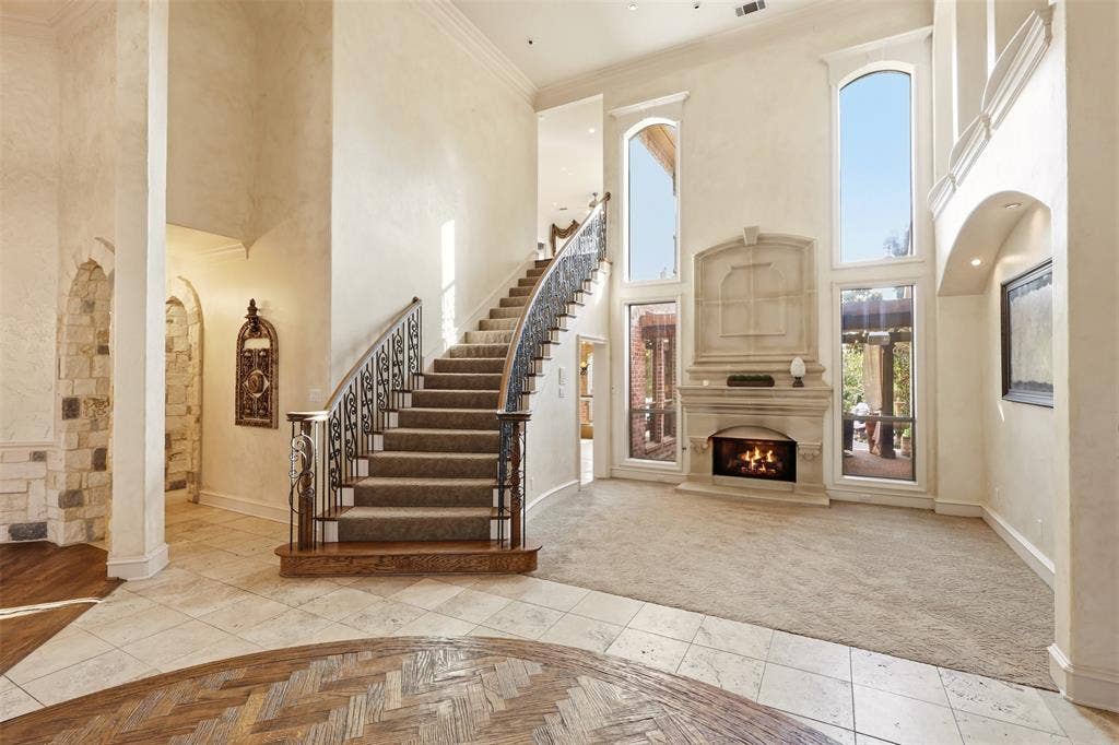 1919 Kings Pass, Heath, TX 75032 Formal entry and sitting area with cast stone gas fireplace