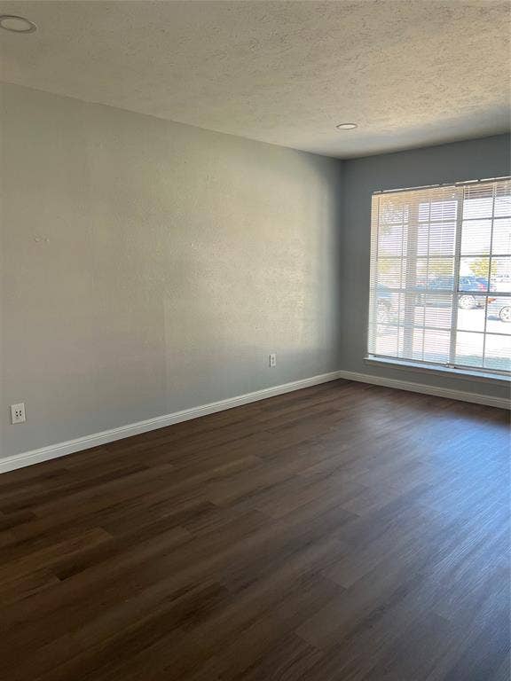 102 Silver Creek Drive, Duncanville, TX 75137 Room featuring wood-finish flooring, recessed lighting, and a multi-pane window with blinds