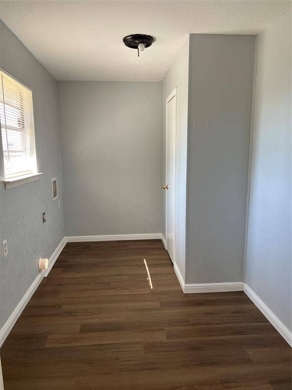 102 Silver Creek Drive, Duncanville, TX 75137 Interior space featuring wood-finish flooring, a single-pane window, flush-mount lighting, and a solid-core interior door