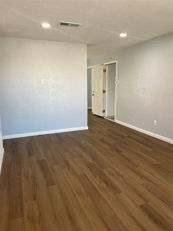 102 Silver Creek Drive, Duncanville, TX 75137 Interior space featuring wood-finish flooring, neutral wall paint, and recessed lighting