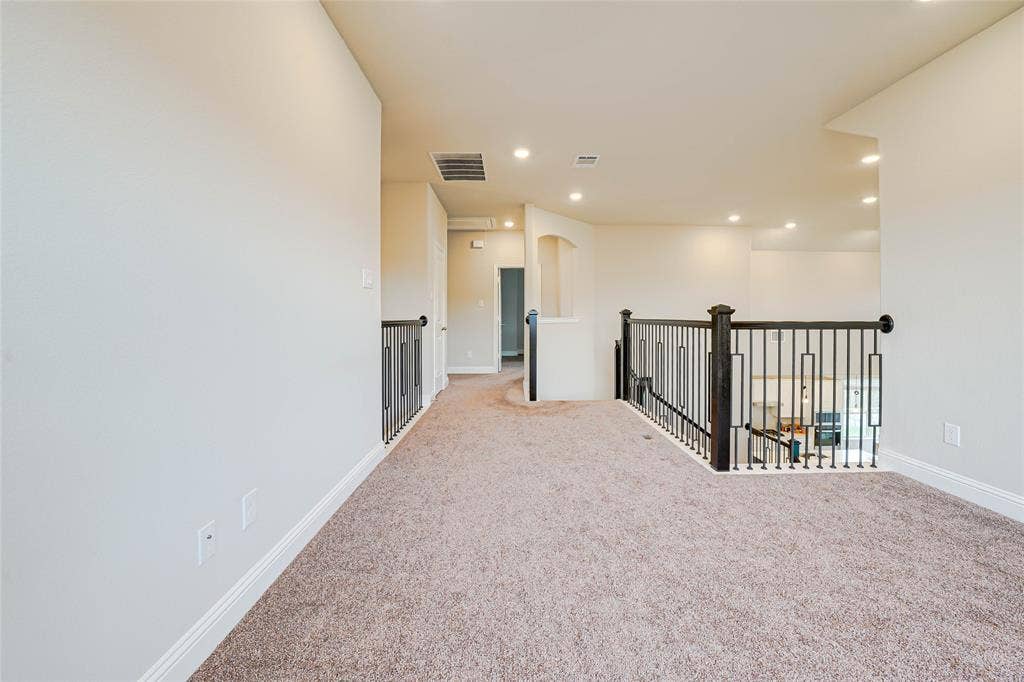 Unfurnished room with carpet flooring and recessed lighting