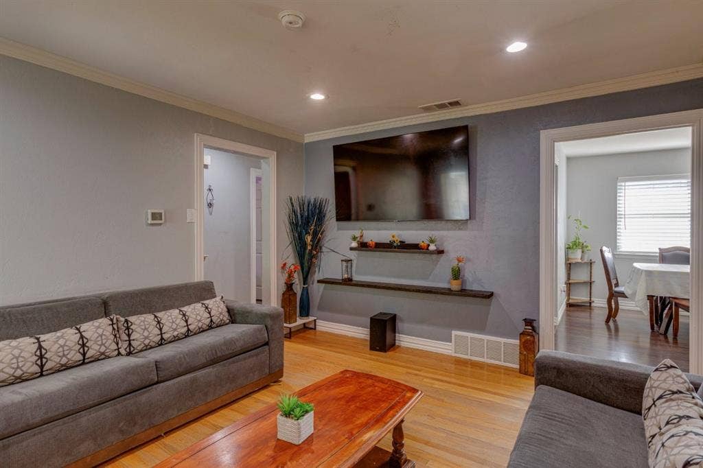 1600 Summit Street, Mesquite, TX 75149 Wood-finish flooring, recessed lighting, and wall-mounted shelving