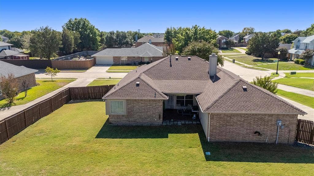 409 Danmire Drive, Murphy, TX 75094 bring your imagination and your backyard dreams