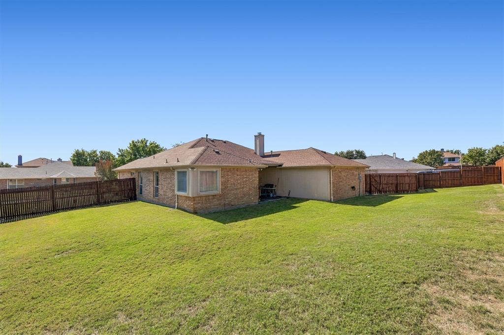 409 Danmire Drive, Murphy, TX 75094 HUGE backyard with grass