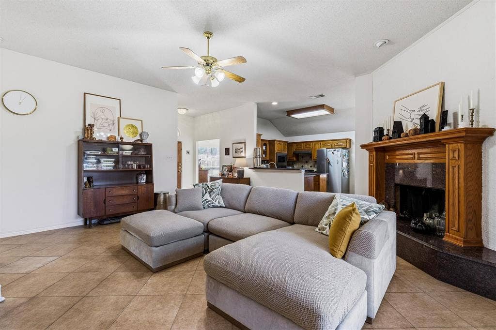409 Danmire Drive, Murphy, TX 75094 Another view of the living room