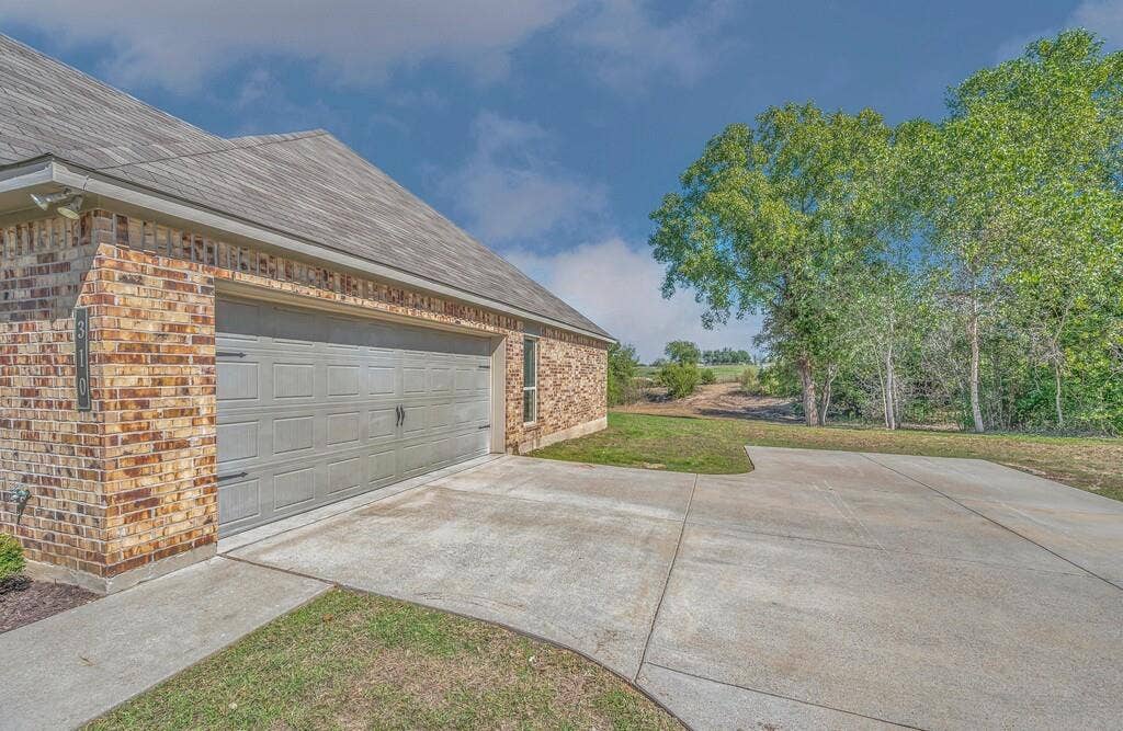 310 Milky Way, Bruceville, TX 76630 2 car attached garage