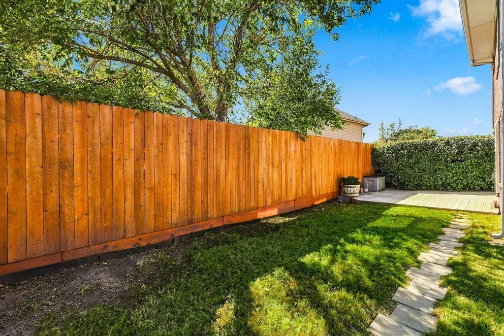 2524 Brooke Trail, Carrollton, TX 75006 Backyard featuring a stained wood.