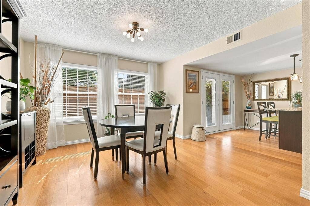 2524 Brooke Trail, Carrollton, TX 75006 Open-concept dining room to eat in kitchen.