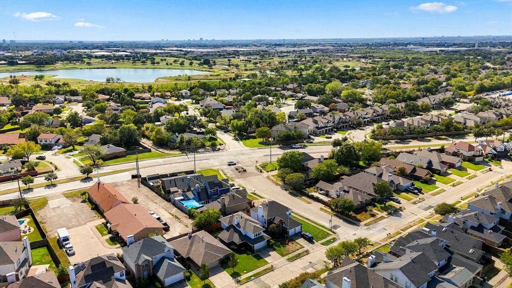 2524 Brooke Trail, Carrollton, TX 75006 Home is located near the Columbian Club Lake.