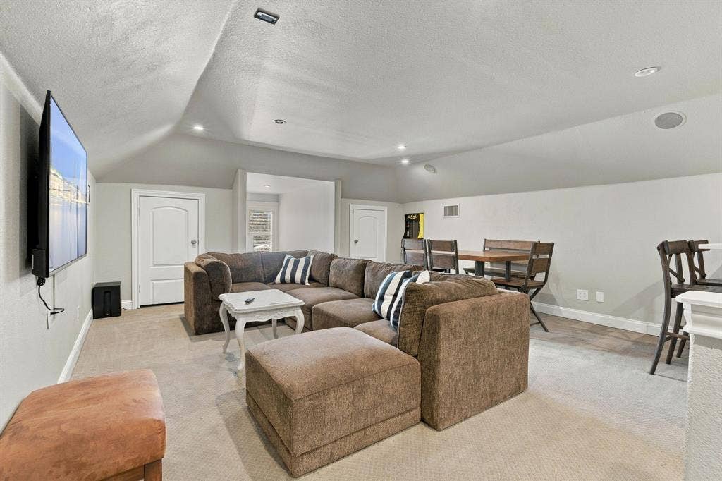 510 E Malone Street, Celina, TX 75009 Vaulted ceilings with recessed lighting, carpeted flooring, and multi-panel interior doors