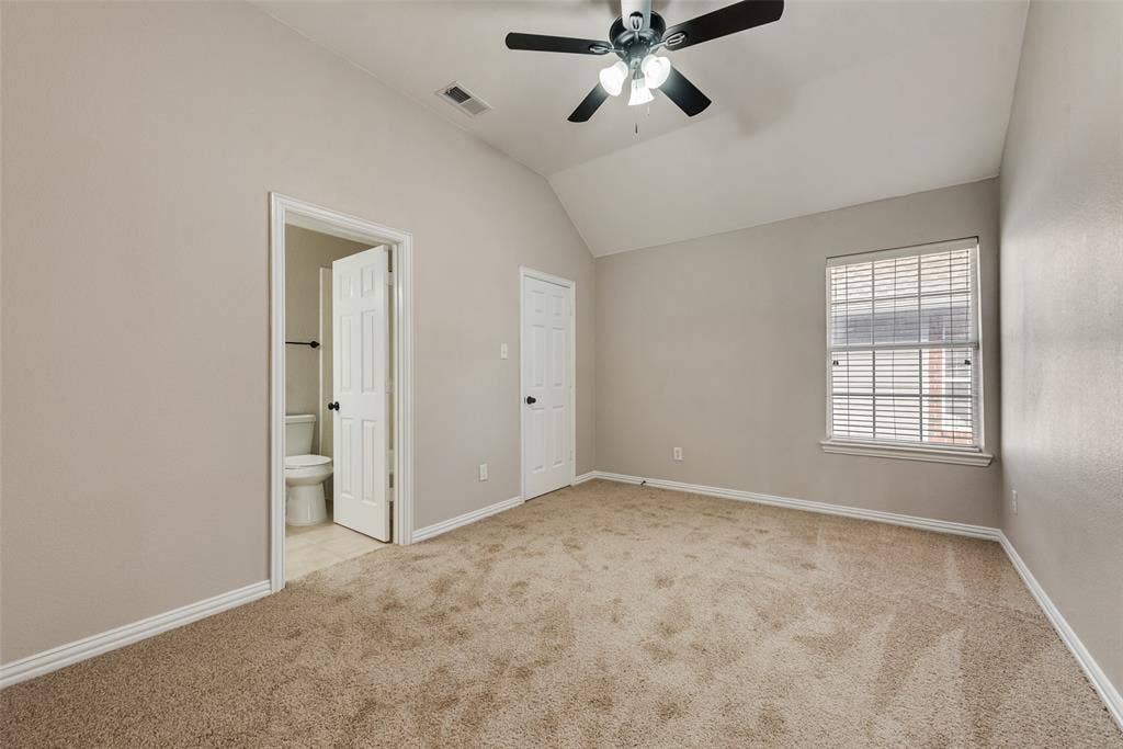 2017 Lunenburg Drive, Allen, TX 75013 Vaulted ceilings, neutral carpeting, multi-light ceiling fan, and multi-panel interior doors