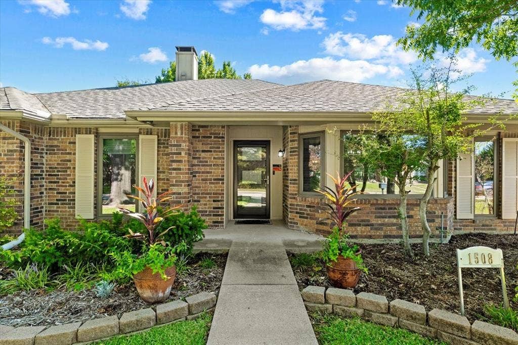 1508 Heidi Drive, Plano, TX 75025 Front porch and beautiful entry with storm door and designer door