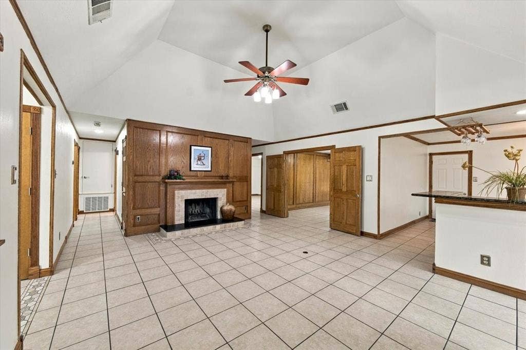 1508 Heidi Drive, Plano, TX 75025 Large living room - Dover White, Sherwin Williams painted walls throughout - rich oak trim around windows including crown moldings and doors