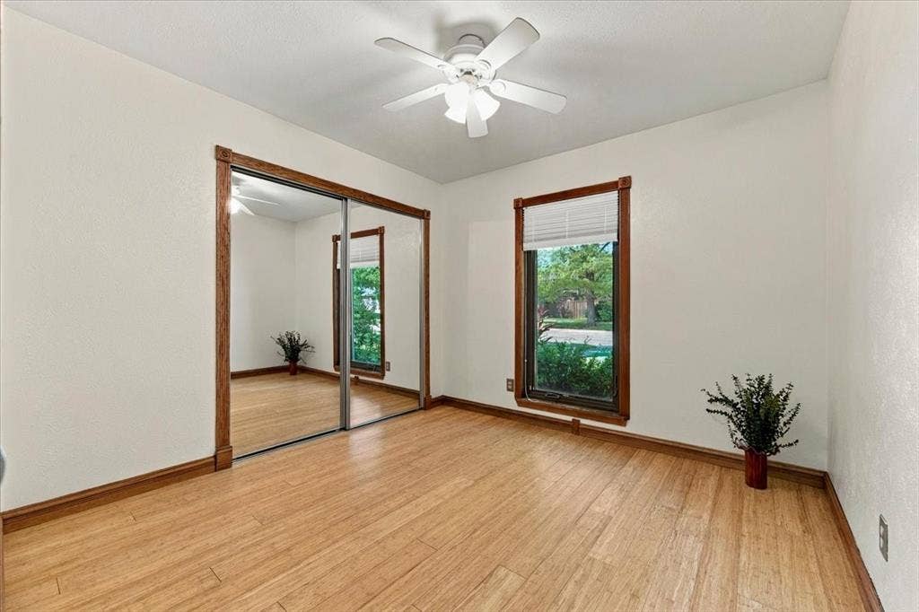 1508 Heidi Drive, Plano, TX 75025 The closet has shelving - glass doors - privacy shades - ceiling fan - bamboo flooring - fresh pained walls -